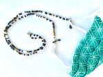 Maskenkette Nyepi